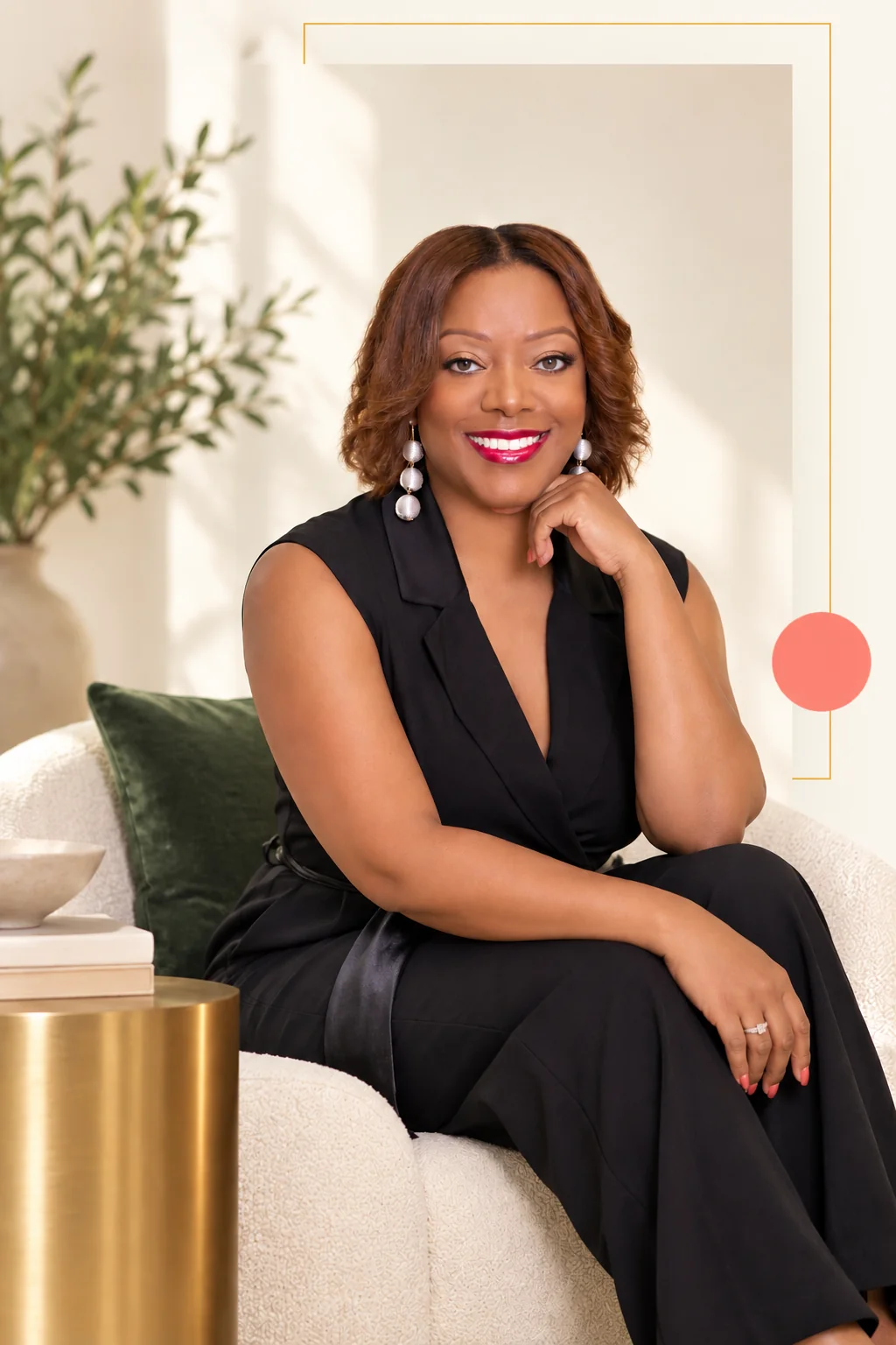 Hyacinth Harley seated in a warm editorial portrait