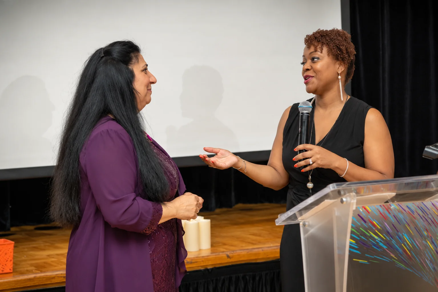 Hyacinth speaking at an event